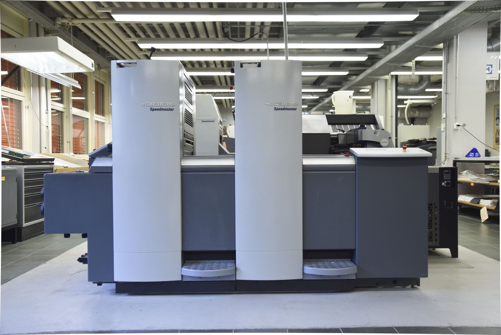 Двухкрасочная листовая Heidelberg Speedmaster в Eracom, Лозанна.
